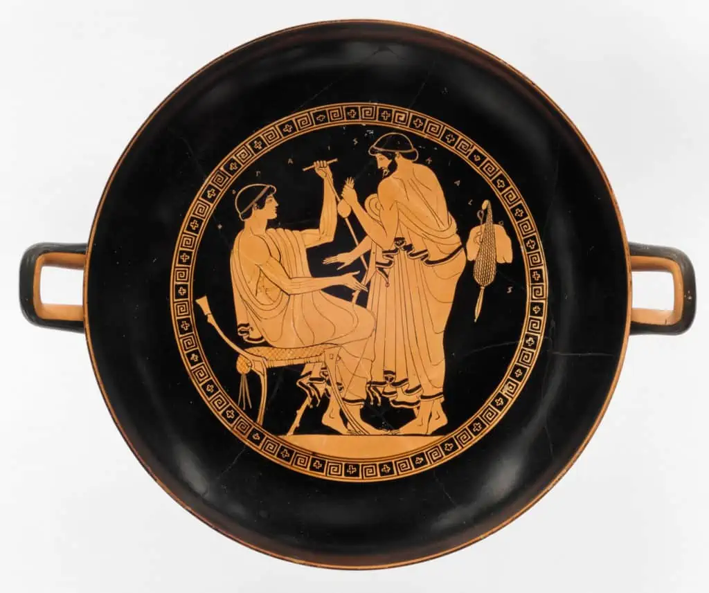 Trinkgeschirr (kylix) um 470 v. Chr. Ein älterer Mann (mit einem Geldsäckel in der Hand) macht einem jungen Mann Avancen.